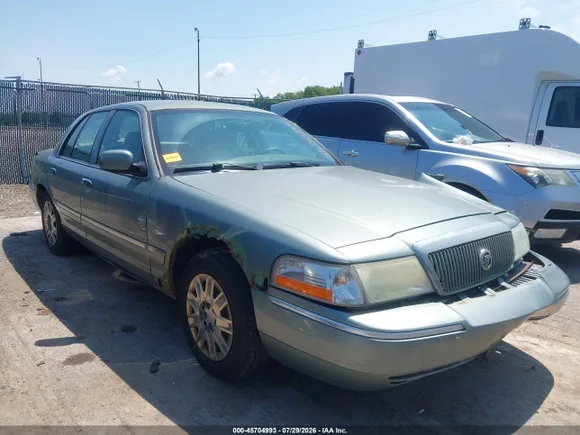 2005 Mercury Grand Marquis GS, VIN 2MEFM74W05X600806 — Side