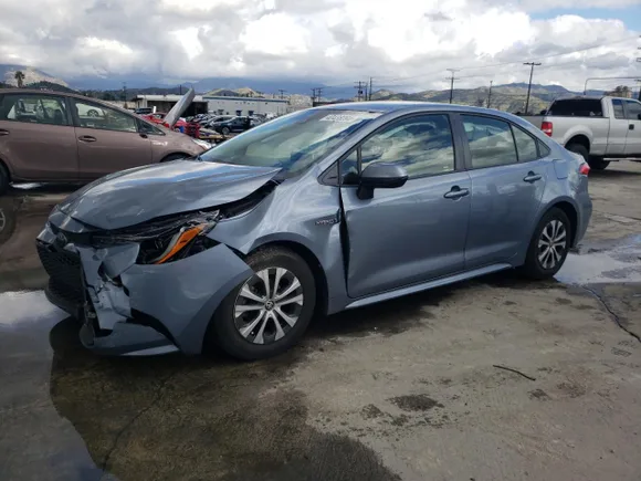 2020 Toyota Corolla Hybrid LE, VIN JTDEBRBE1LJ025372 — Front end