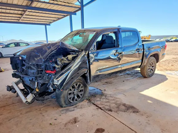 2021 Toyota Tacoma SR5, VIN 3TMAZ5CNXMM142082 — Front end